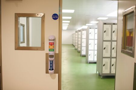 Locker room inside a factory for staff to keep their property locked away.の写真素材