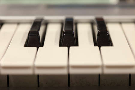 row of black and white piano keysの写真素材
