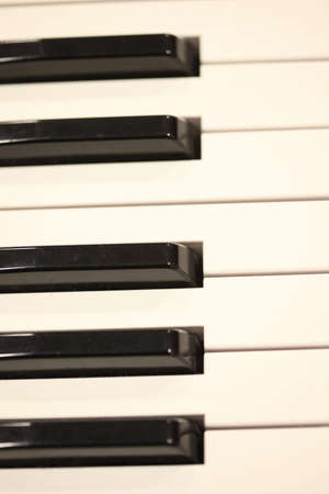 row of black and white piano keysの写真素材