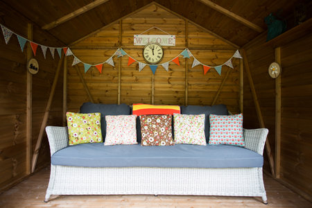 Sofa and bunting with a welcome signの写真素材