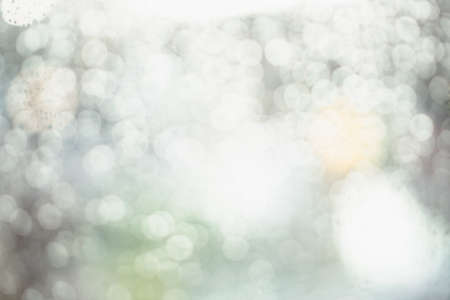 Blurred Bokeh abstract nature with Silver  light circles backgroundの写真素材