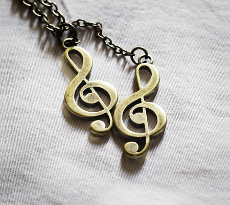 metal clef music on fabricの写真素材