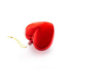red heart on white background, symbol concept