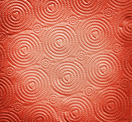 abstract red paper valentine background with heart shape background texture in modern art design layout, pattern shape design red burgundy background in vignette backgroundの写真素材