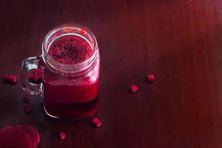 Beetroot smoothie healthy and herb on wooden table backgroundの写真素材