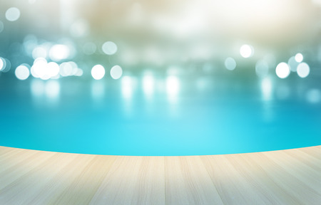 Wooden floor tropical swimming pool on pastel background, soft and blur conceptの写真素材