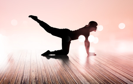 woman yoga silhouette exercise floor rotten wood, soft and blur , double exposure conceptの写真素材