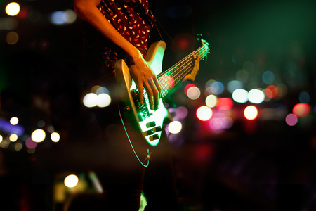 Guitarist on stage abstract colorful background, soft and blur conceptの写真素材