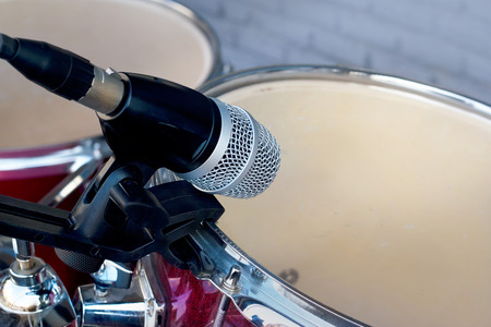 microphone for rrum set-up on wall backgroundの写真素材