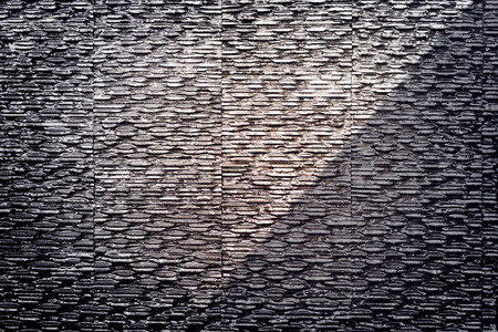 Modern stone texture wall and wet water backgroundの写真素材