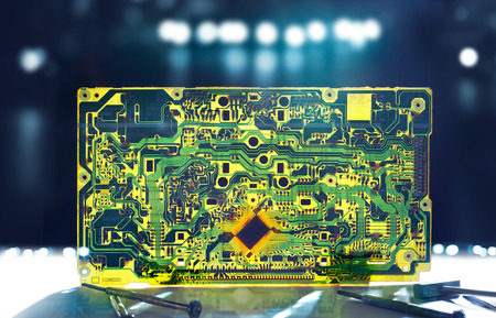 Electronic circuit transparent grunge and repair tools on dark backgroundの写真素材