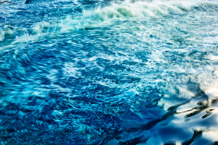 colorful wave on the beach, soft focus and motion blurの写真素材
