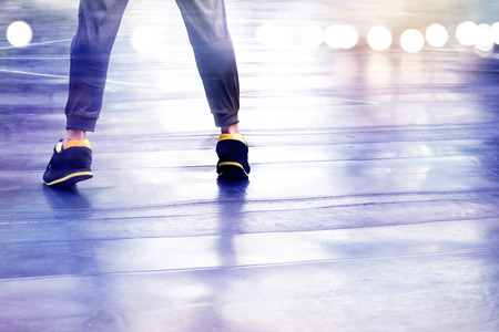 Abstract women exercise on cement floor, colorful and pastel purple tone concept, soft focus and blurの写真素材