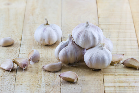 Garlic on the wooden backgroundの写真素材