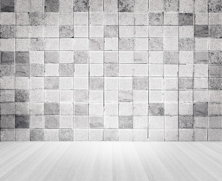 Grunge vintage style concrete tile wall and wooden floor texture for backgroundの写真素材