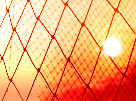 Silhouette colorful of goal net soccer in the sunsetの写真素材
