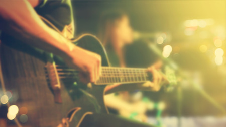 Guitarist on stage for background, soft and blur concept, Vintage color tone styleの写真素材