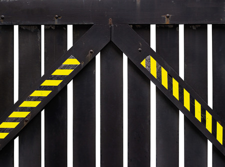 wood door or fence with sign on white backgroundの写真素材