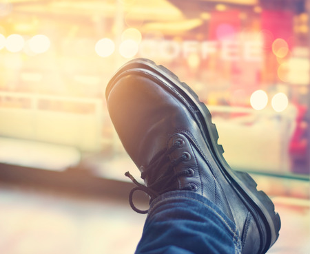 black men's boots on colorful backgroundの写真素材