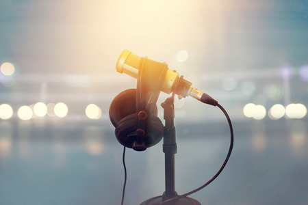 Close up microphone and headphone for announcer in boxing stadium, vintage color toneの写真素材