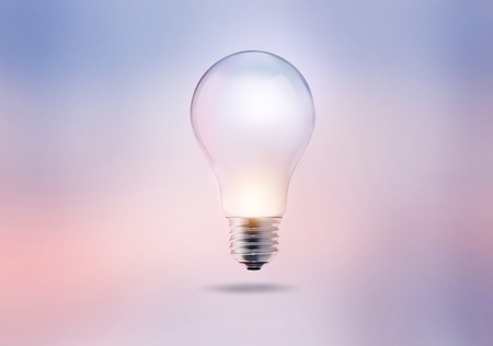light bulb on a pastel color tone backgroundの写真素材
