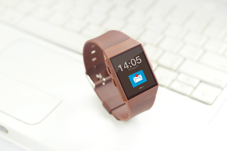 smart watch on laptop backgroundの写真素材