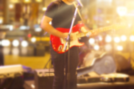 Guitarist on stage for background, soft and blur conceptの写真素材