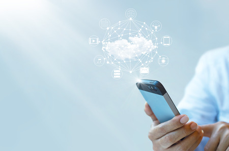 Businessman working with a Cloud Computing on Smartphoneの写真素材