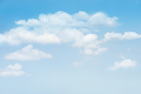 Blue sky with clouds for background, blank textの写真素材