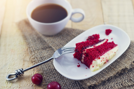 Coffee with cherry cake on wooden backgroundの写真素材