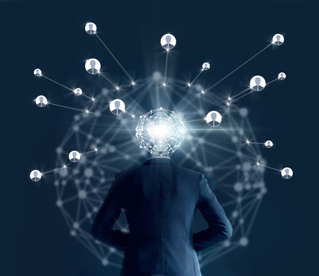Businessman with global network connection head looking for employee from social connection on dark background, business conceptの写真素材