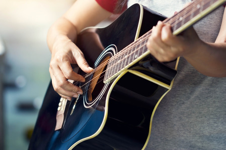 Guitarist on stage, soft focusの写真素材