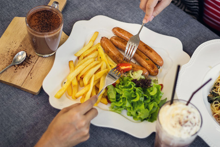 woman and man having meeting on friendship lunchの写真素材