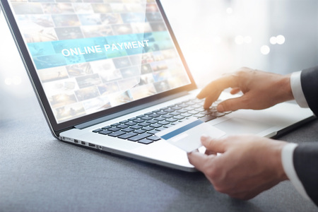 Hands of businessman holding credit card and using laptop, online shopping concept, all on laptop...