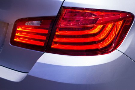 Detail on the back light of city carの写真素材