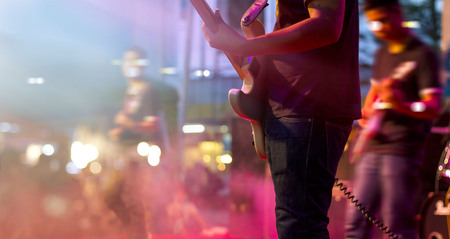 Guitarist on stage for background, soft and blur conceptの写真素材