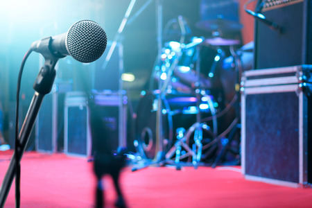 Microphone and music instrument on stage for backgroundの写真素材