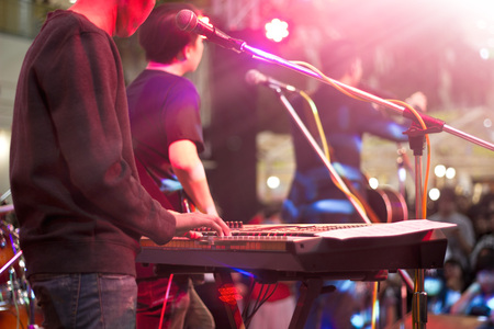 Keyboardist on stage for background, soft and blur conceptの写真素材