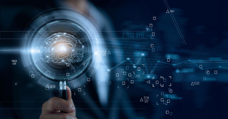 Businessman holding magnifying glass and digital brain, searching of a teamwork brainstrom for...