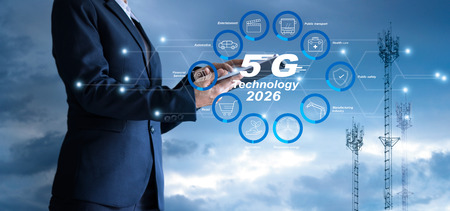 Businessman touching tablet and icon business is growing and make money from 5G technology in 2026....