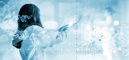 Medicine doctor analysis electronic medical record on interface display. DNA. Digital healthcare and network connection on hologram modern virtual screen, innovative, medical technology and network concept.の写真素材