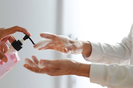 Hand sanitizer in family, Virus and illness protection coronavirus or covid-19 and flu outbreak.
