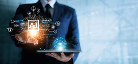 Businessman touching the brain working of Artificial Intelligence (AI) in the futuristic business...