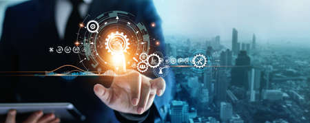 Industry 4.0, Businessman touching brain in cogwheel, Innovative and futuristic, Business process...