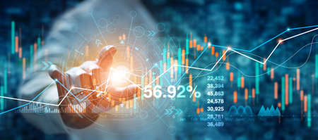 Businessman hand touching of forex graph growth interface and financial data analysis. Stock market...