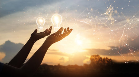 Innovative idea. Inspiration and network. Hands holding light bulbs as symbol of innovation on...