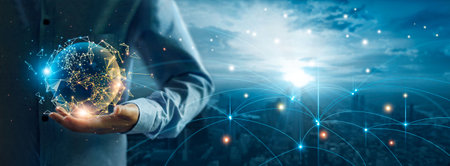 Businessman holding global digital network and data customer connection, Social network and data exchange of technology, Networking structure on blue city background.の写真素材