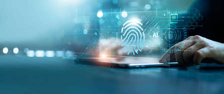 Businessman using tablet and fingerprint scanning unlock and access to business data network....