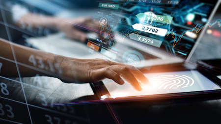 Businessman using fingerprint identification to access personal financial data. Idea for E-kyc (electronic know your customer), biometrics security, innovation technology against digital cyber crime.の写真素材