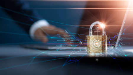 Businessman using laptop and set up network connection with shield guard to protect cyber attacks....